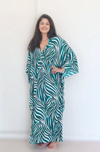 Seen here:  Gorgeous Kaftan crafted from the softest viscose with eye-catching green animal print, this stunning boho chic kaftan will turn some heads!! Wear it while lounging at the pool or at home. SUMMER DRESS