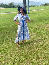 Look your best this summer with our Gorgeous breathable rayon shirt dress in dreamy tropical blue print.  Long dress with side pockets and slits.  Also get a desired silhouette with a detachable belt.  Simple yet elegant and super comfy.  Pair it up with wedges for a brunch or wear it as a beach cover up!!   